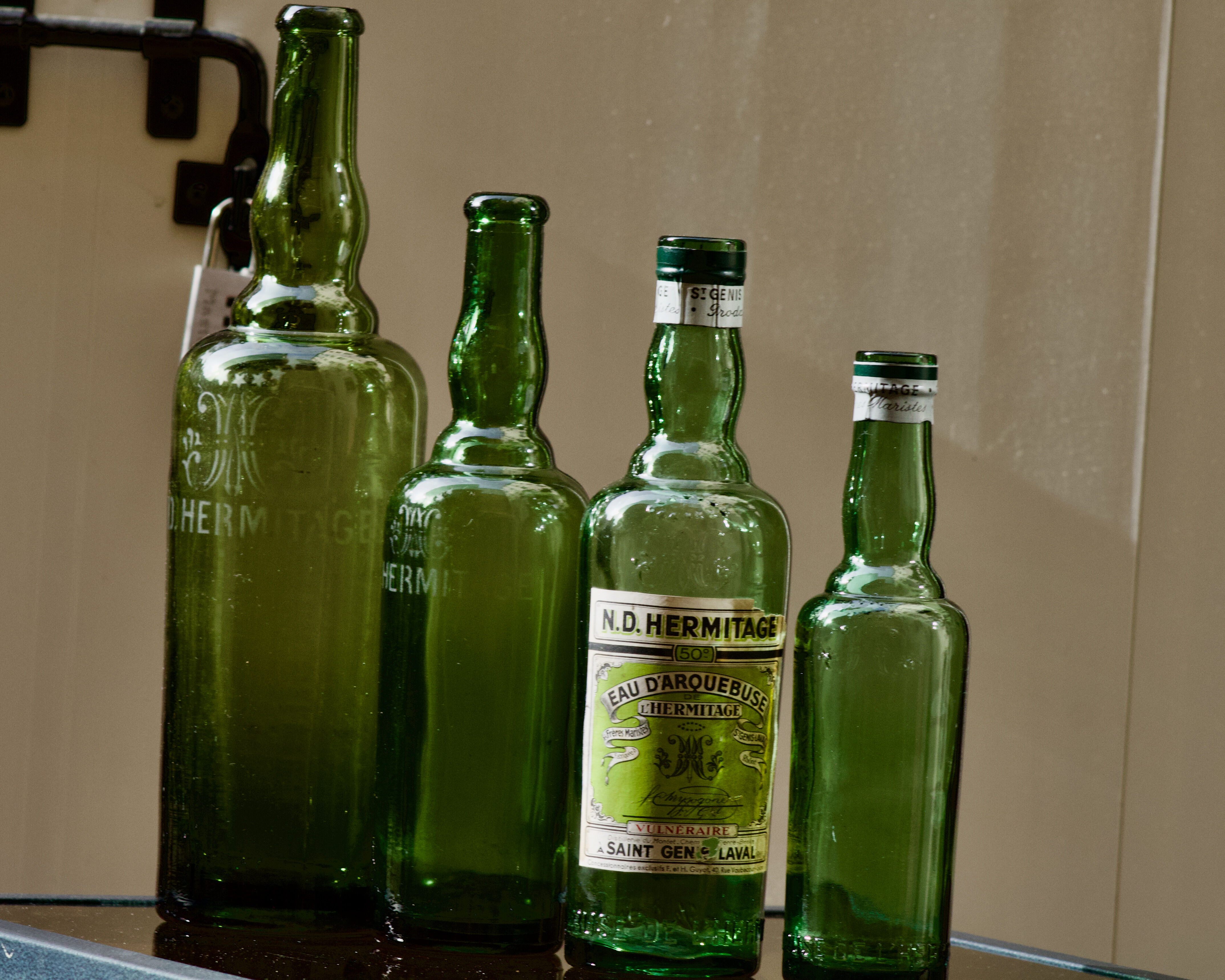 Lot of 4 old bottles "L'Hermitage" water of Saint Genis Laval (Dept 69)