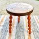 Tabouret tripode pied bobine terracotta