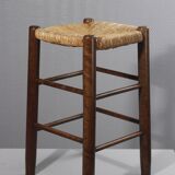 Vintage straw stool in the style of Charlotte Perriand, 1970s.