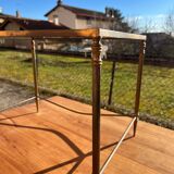 Brass side table with smoked glass.