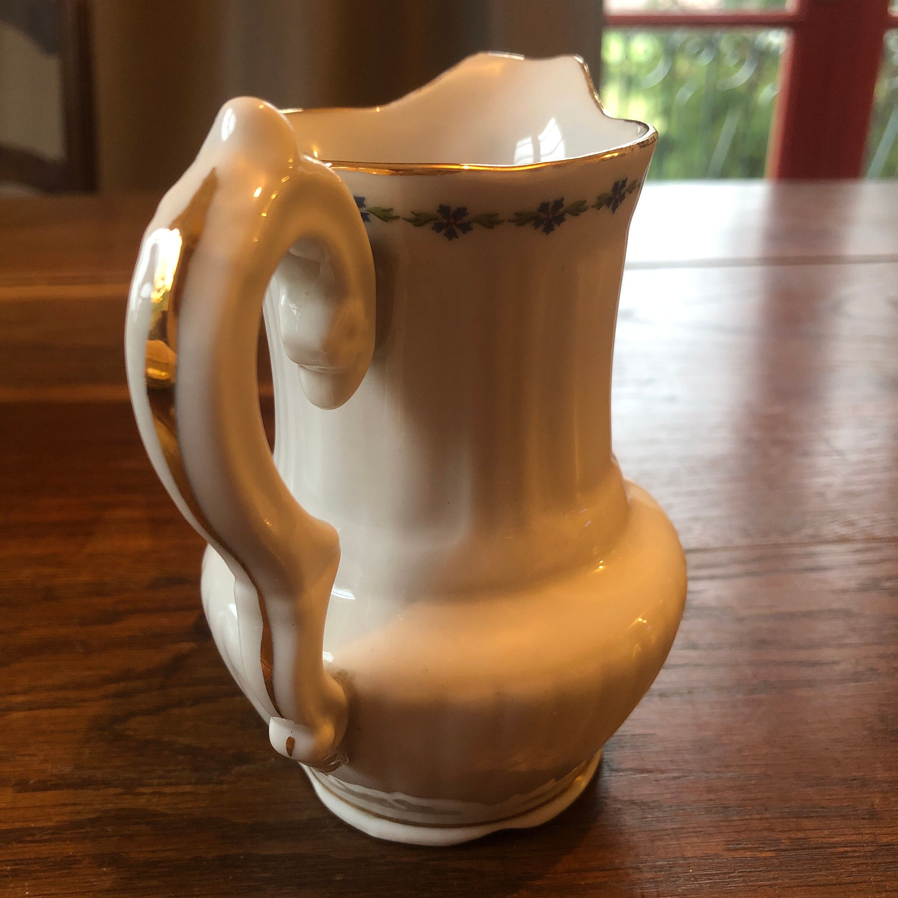 Old milk jug limoge