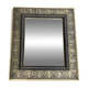 Bevelled mirror from the 19th century with gold and black palmettes.