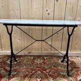 Authentic bistro table with white marble and cast iron from the early 20th century.