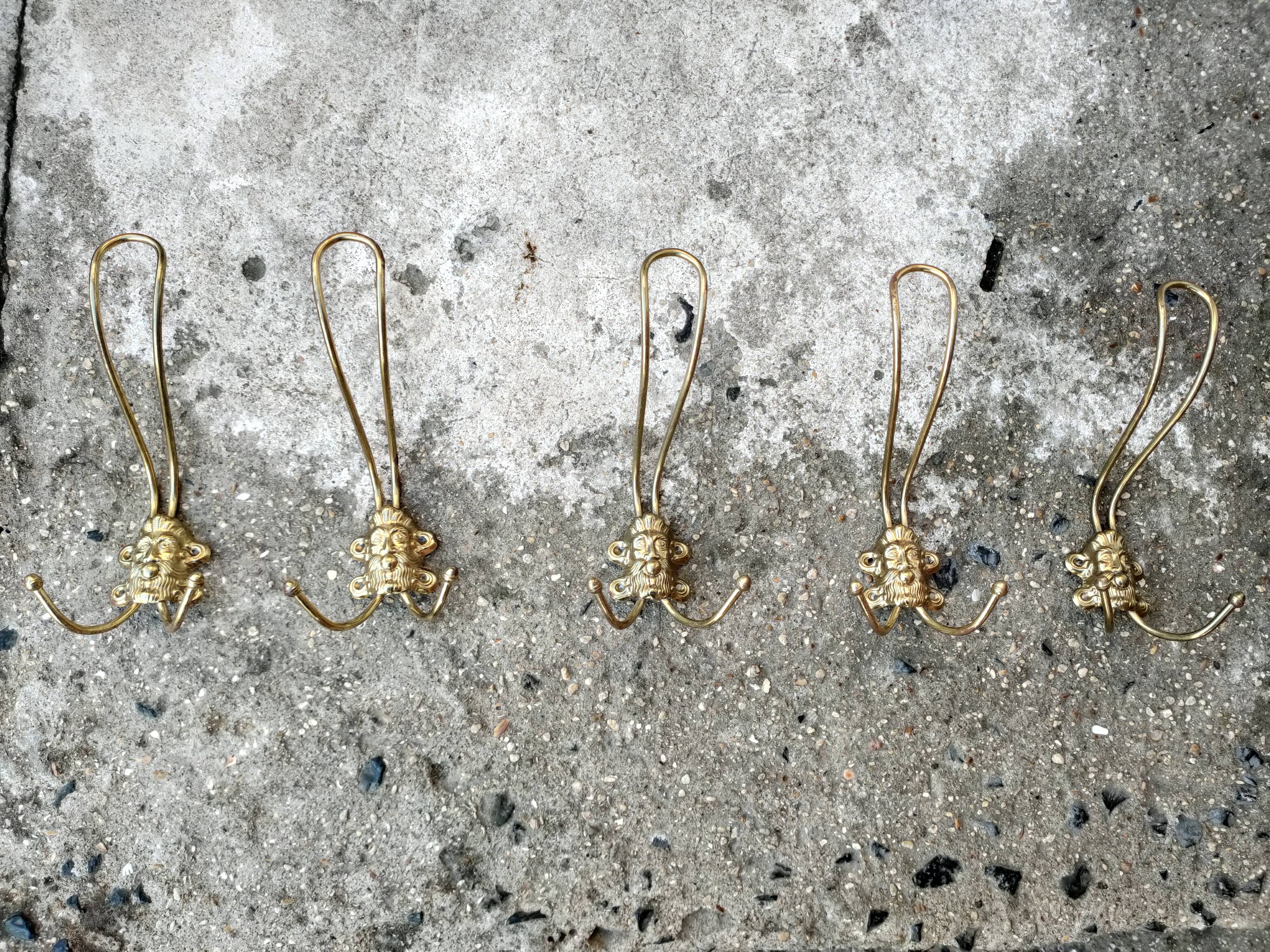 set of 5 antique gold metal hooks