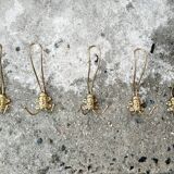 set of 5 antique gold metal hooks