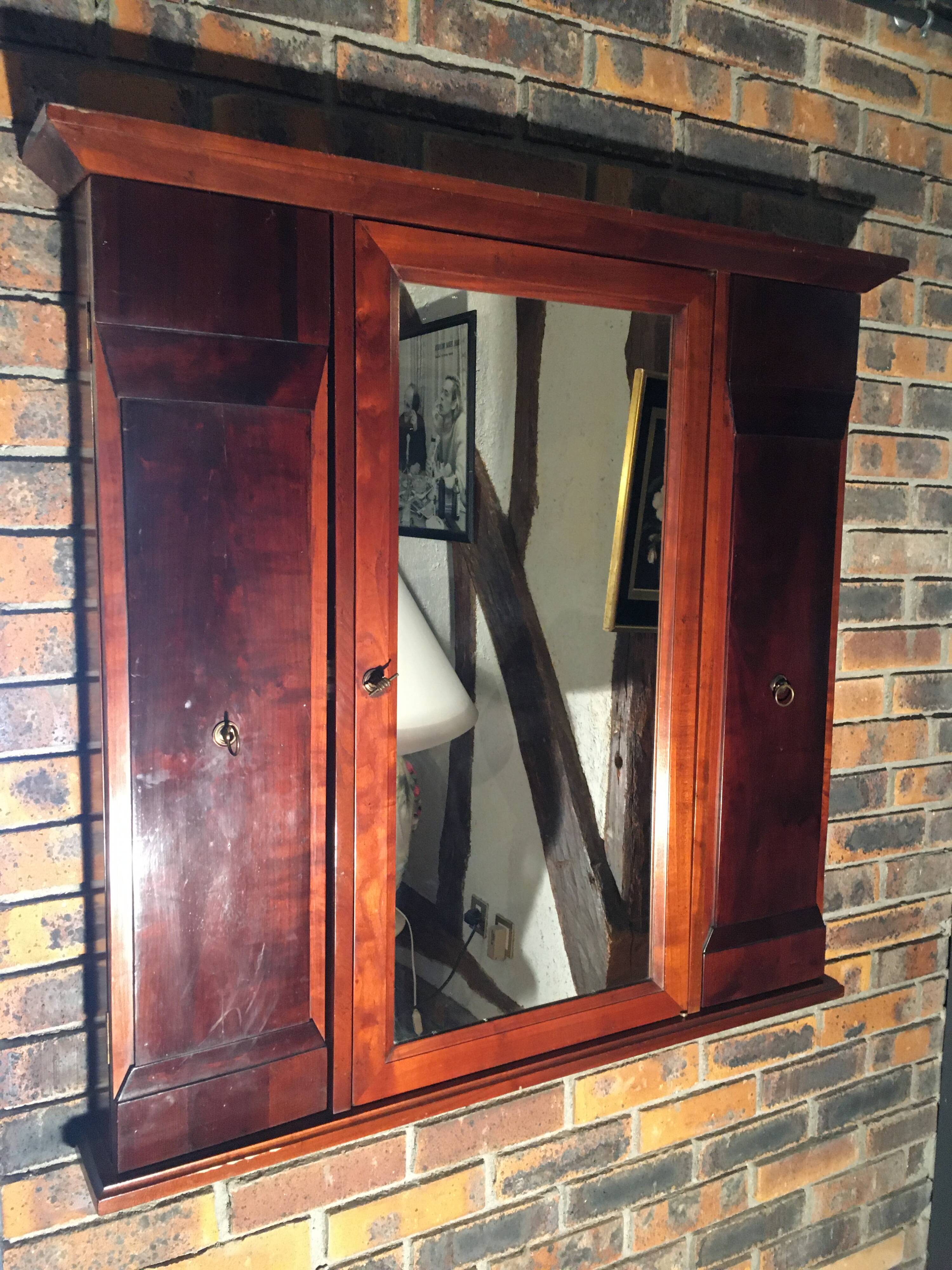 Vintage “Felix Monge” wall tie in cherry wood with mirrors