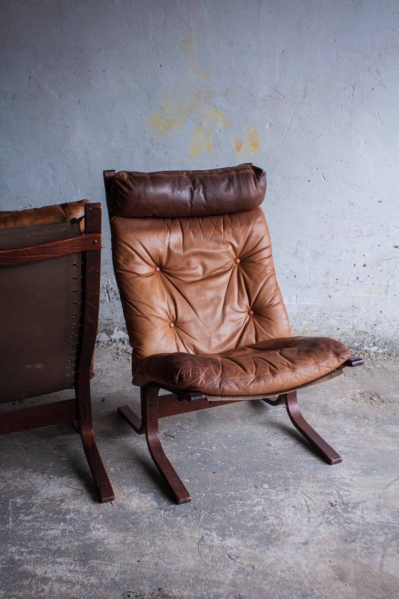 Siesta armchair by Ingmar Relling with ottoman — bentwood dark brown frame, cognac leather