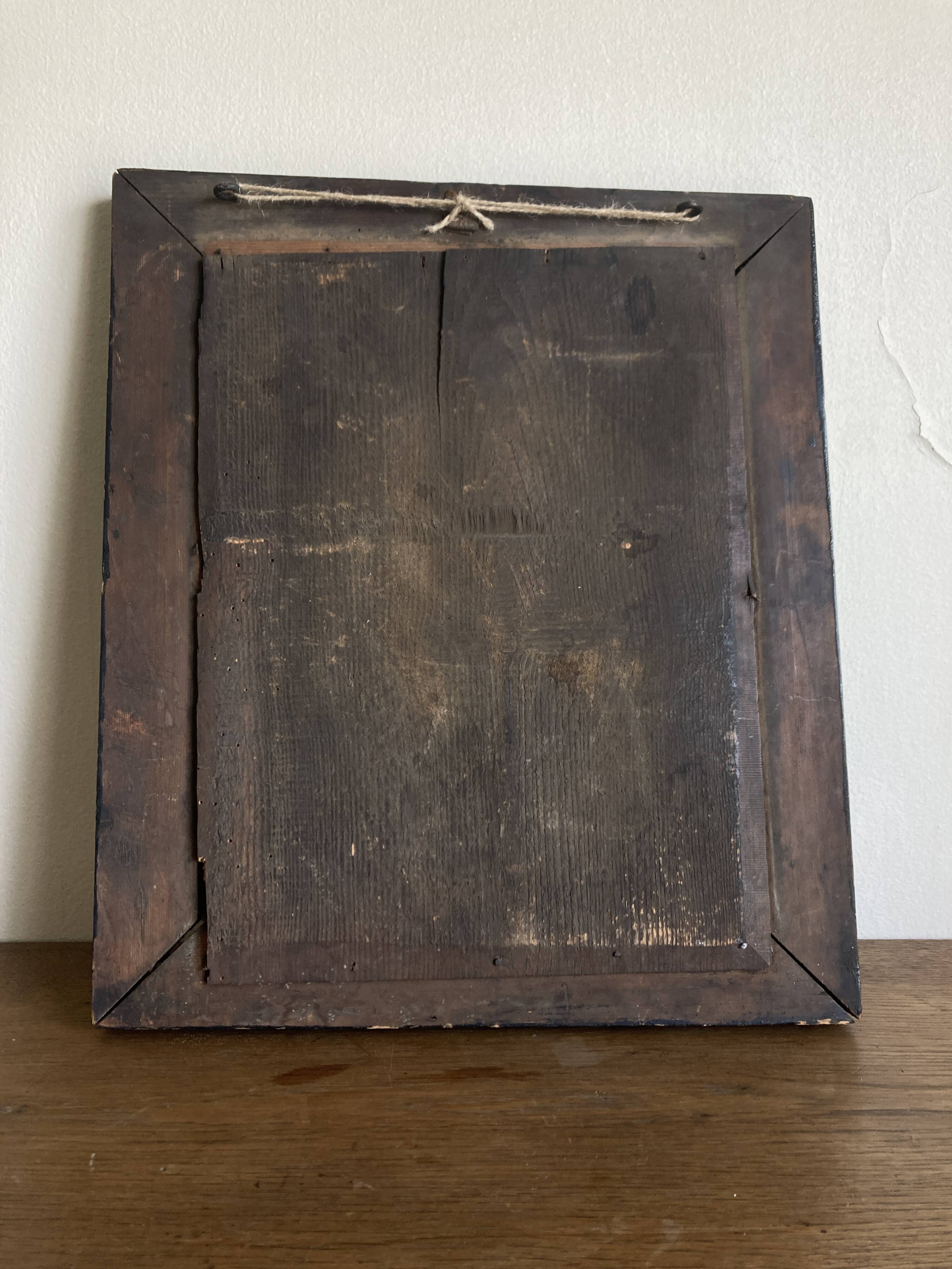 19th century blackened mirror with pitted glass 34cm x 40cm