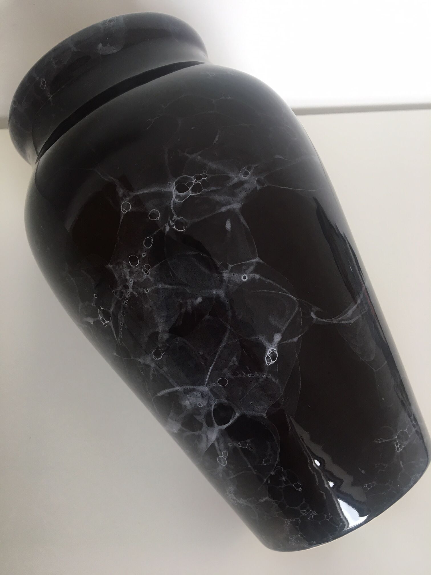 Marbled black faience vase