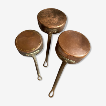 Copper pans for decoration with eb cast iron handle.