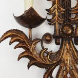 Pair of wrought iron sconces "Venetian masks"