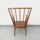 Vintage wooden armchair Baumann model Éventail from the 1960s.