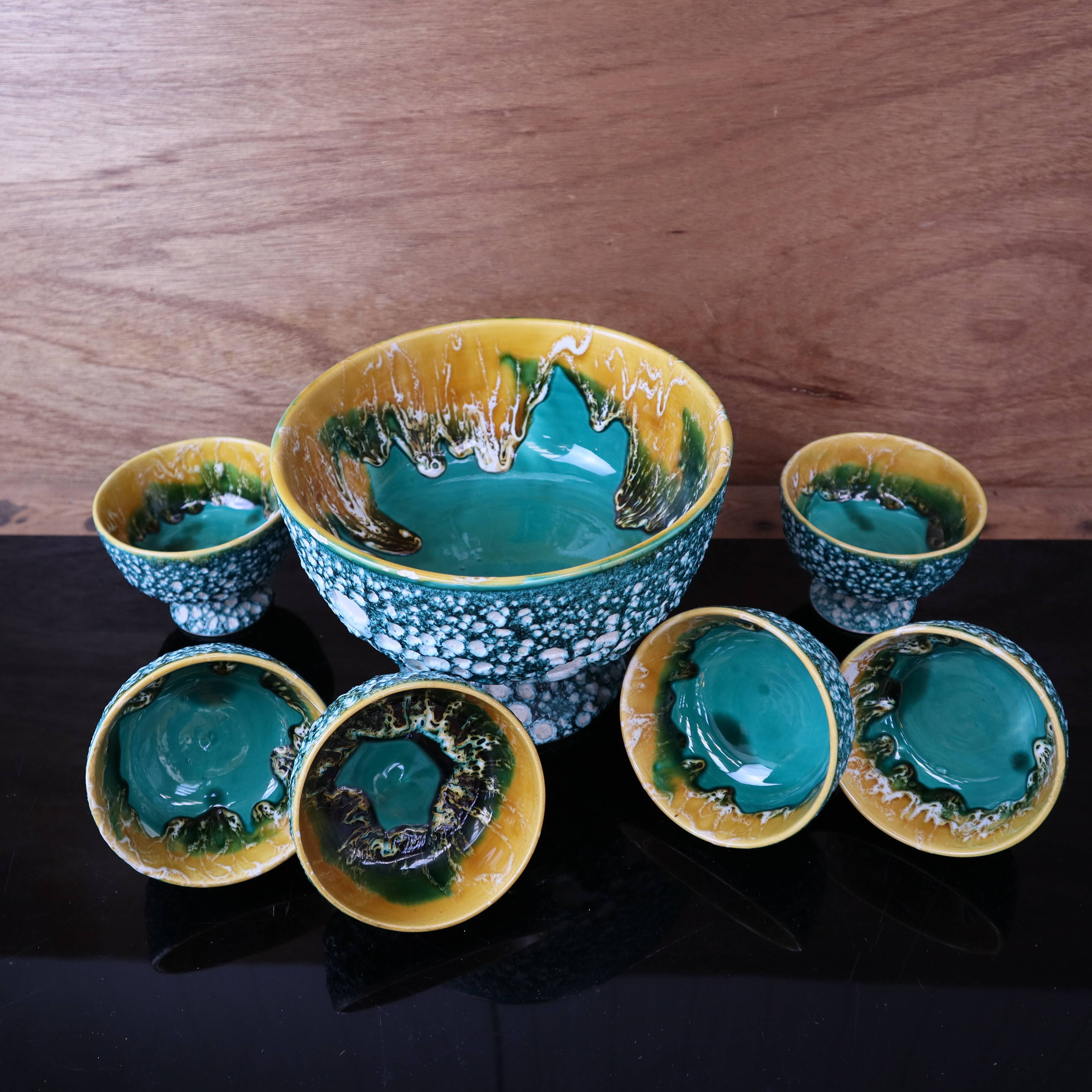 Salad bowl and its 6 Lava Green bowls in Vallauris style.