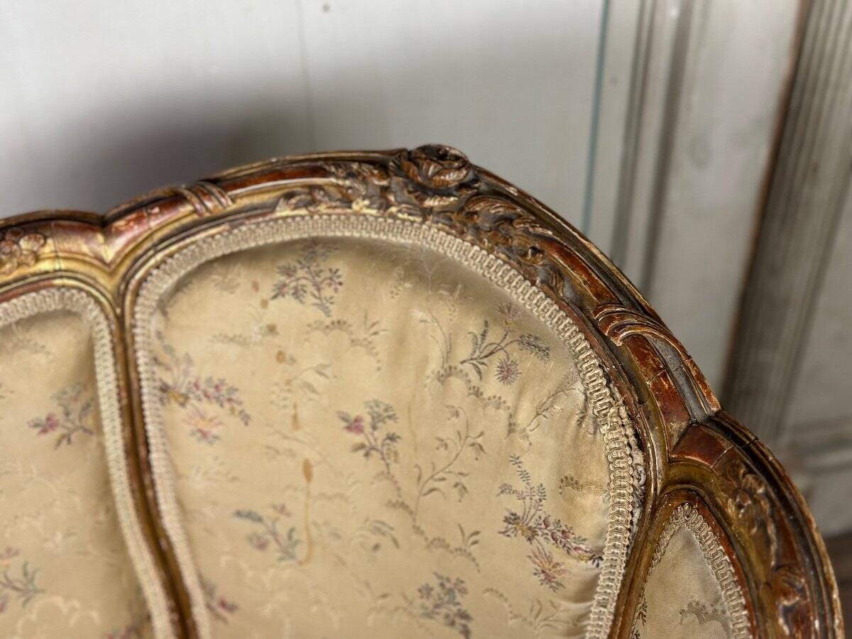 A Louis XV style child's bergère chair in carved and gilded wood, circa 1880
