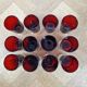 12 vintage Luminarc glasses in ruby red.