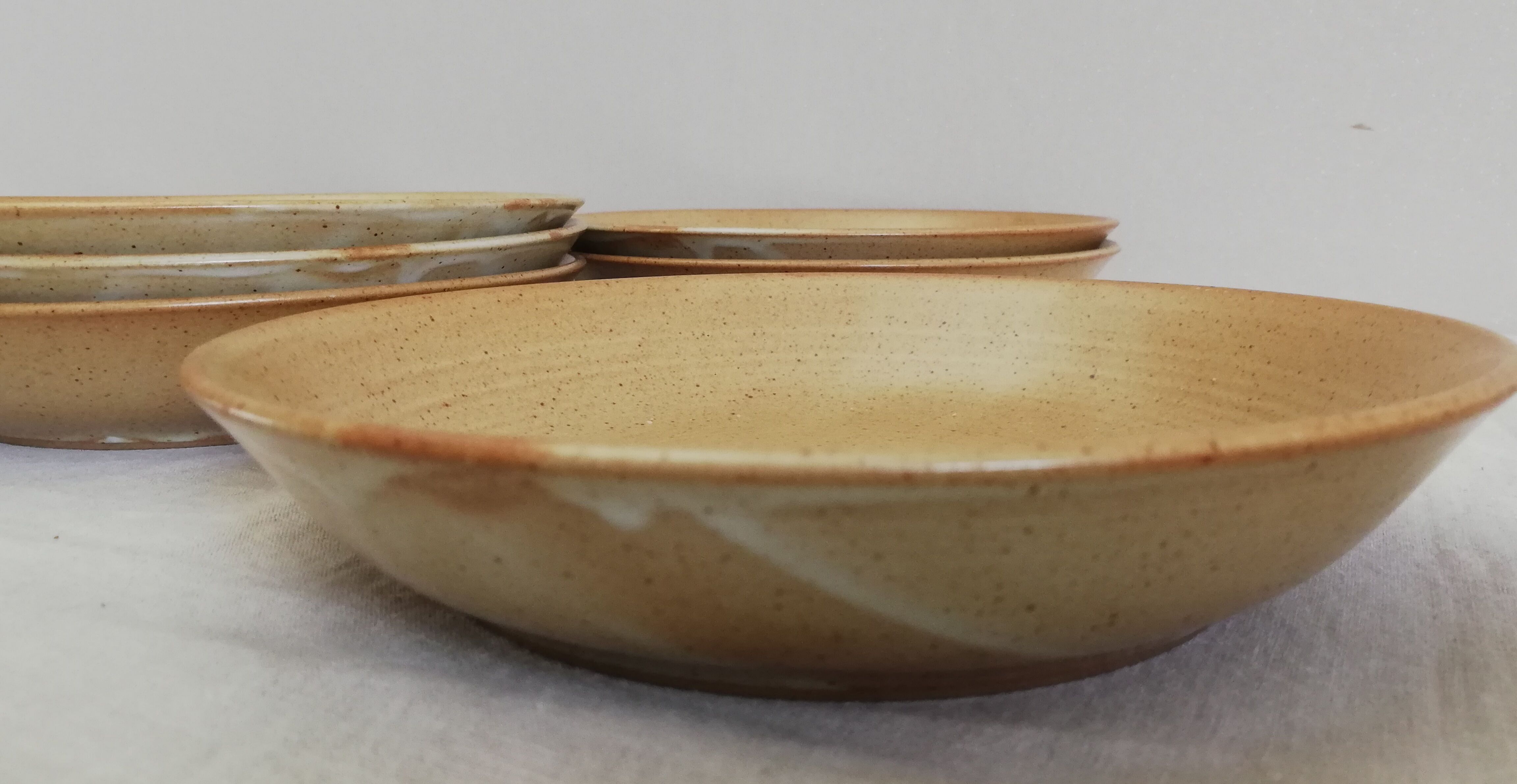 Series of 11 hollow plates Grès Village CNP