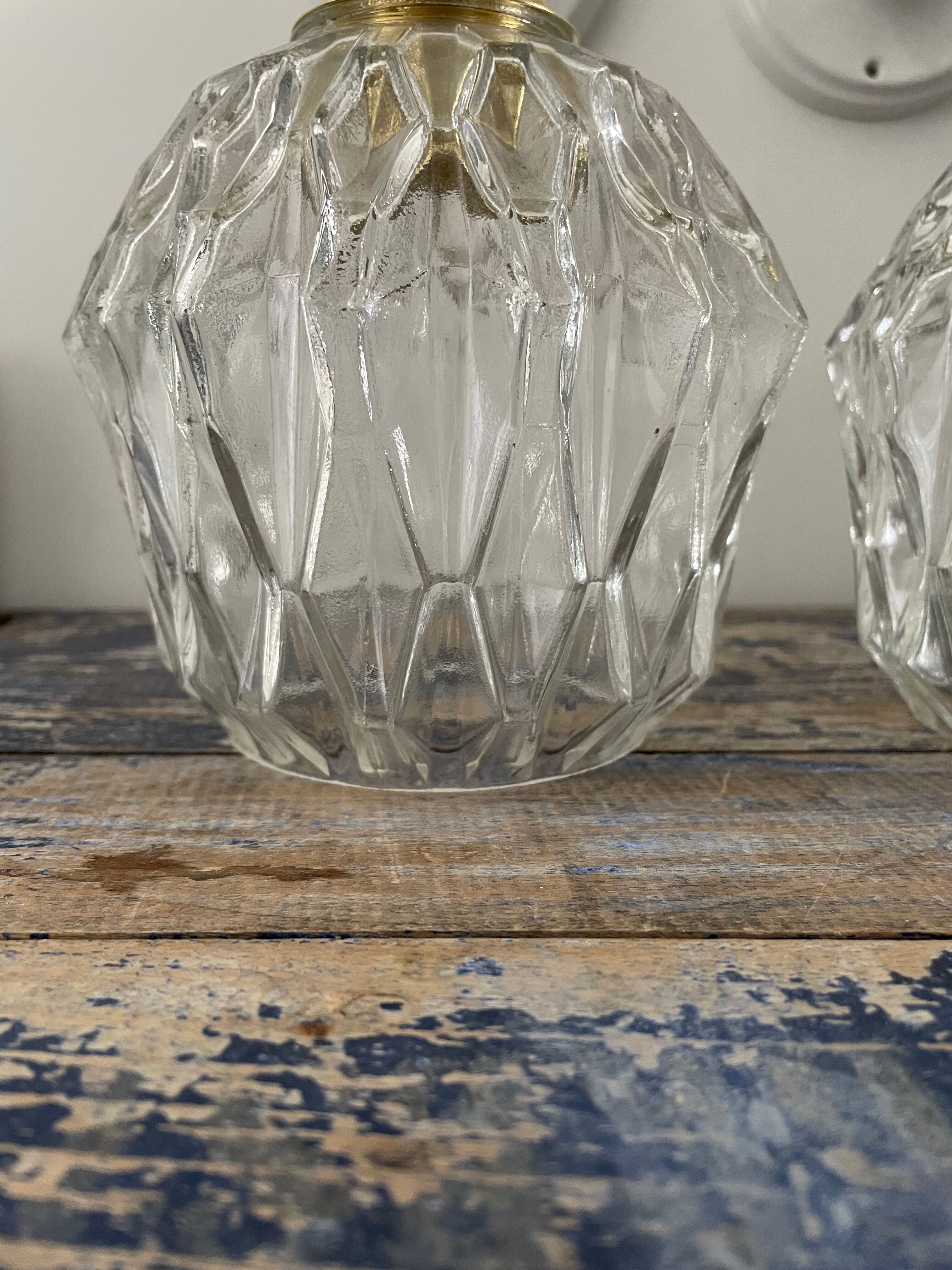 Set of two vintage sconces in chiseled glass