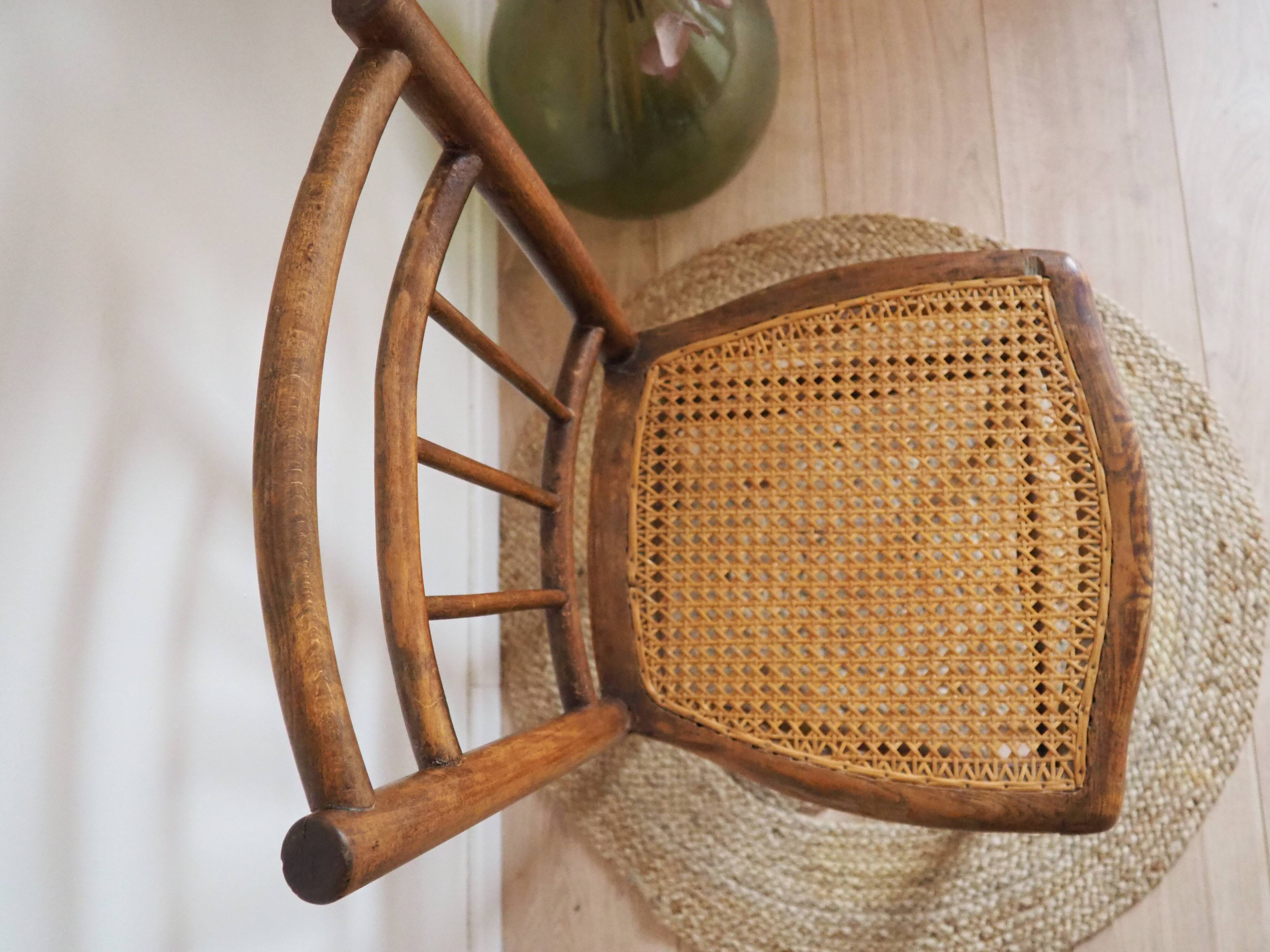 Wooden chair with cane seat
