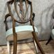 According to George Hepplewhite: pair of 19th century mahogany office armchairs