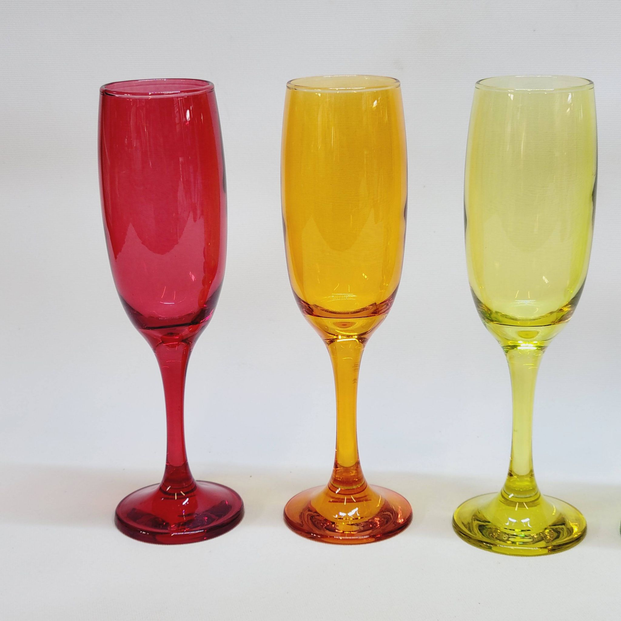 6 multicolored glass champagne flutes red orange yellow green blue purple