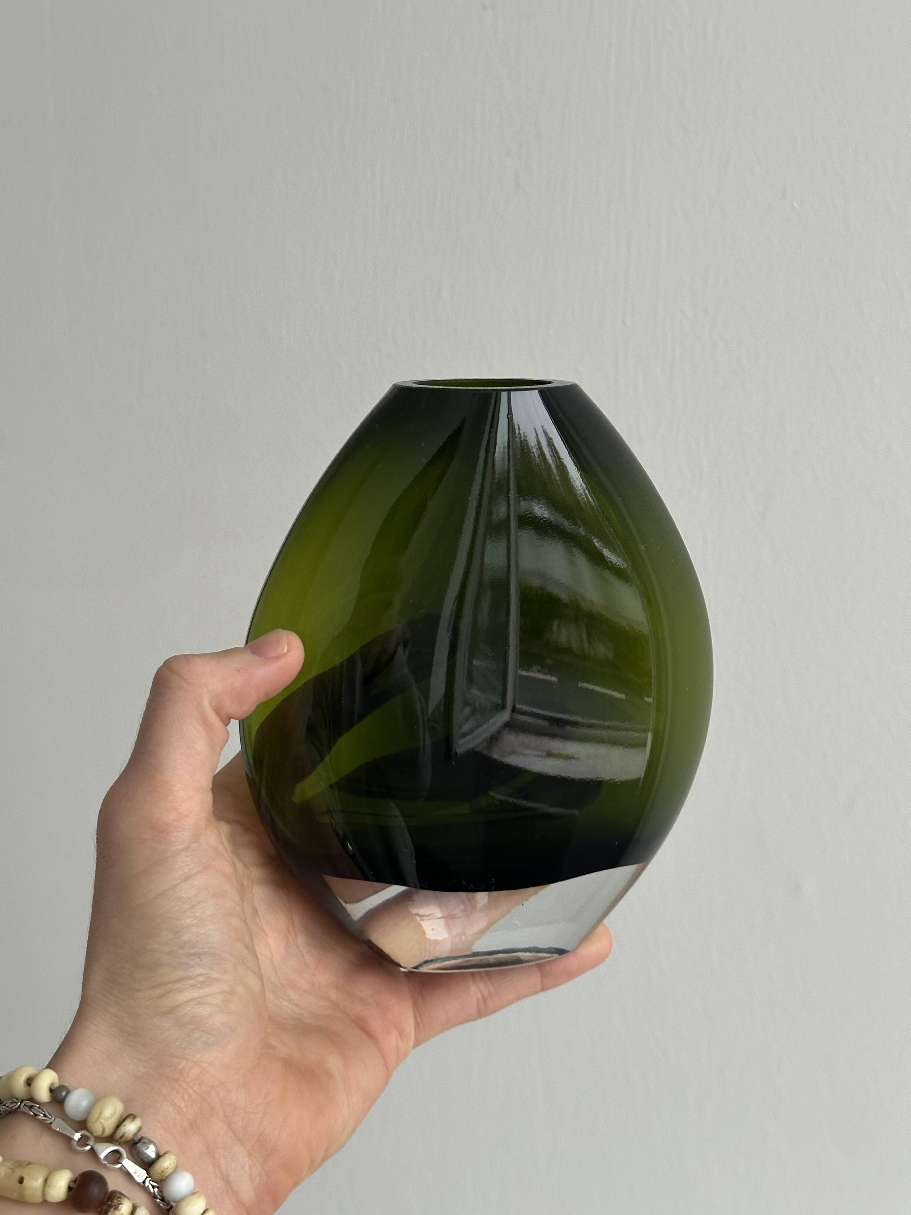 Blown green glass vase