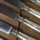 Set of 10 antique silver metal knives