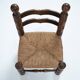 Chaise en paille tissée basse dans le style de Charles Dudouyt, années 1940.