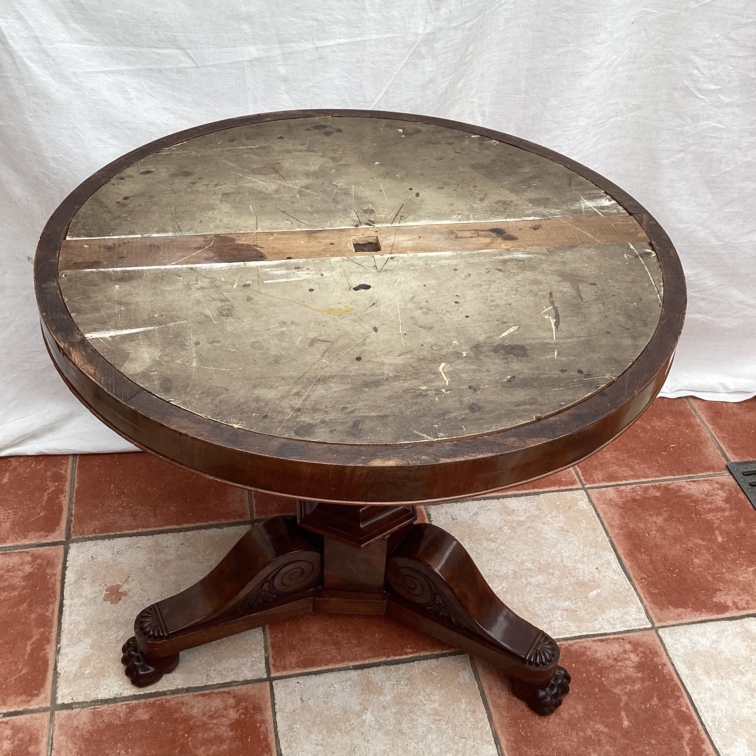 Old pedestal table in oak wood with marble