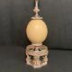 Old lamp foot silver metal and ostrich egg late nineteenth century