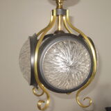 Suspension of years 50-60 in glass and metal