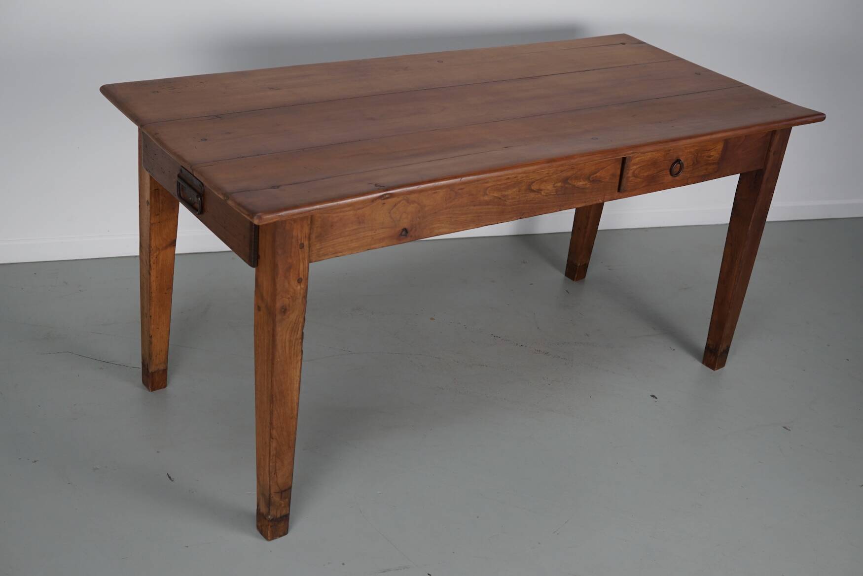 Rustic dining table in fruitwood from the early 20th century