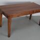 Rustic dining table in fruitwood from the early 20th century