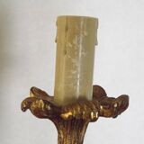 Pair of simple vintage French wall sconces in Art Nouveau bronze with leaf-shaped details.