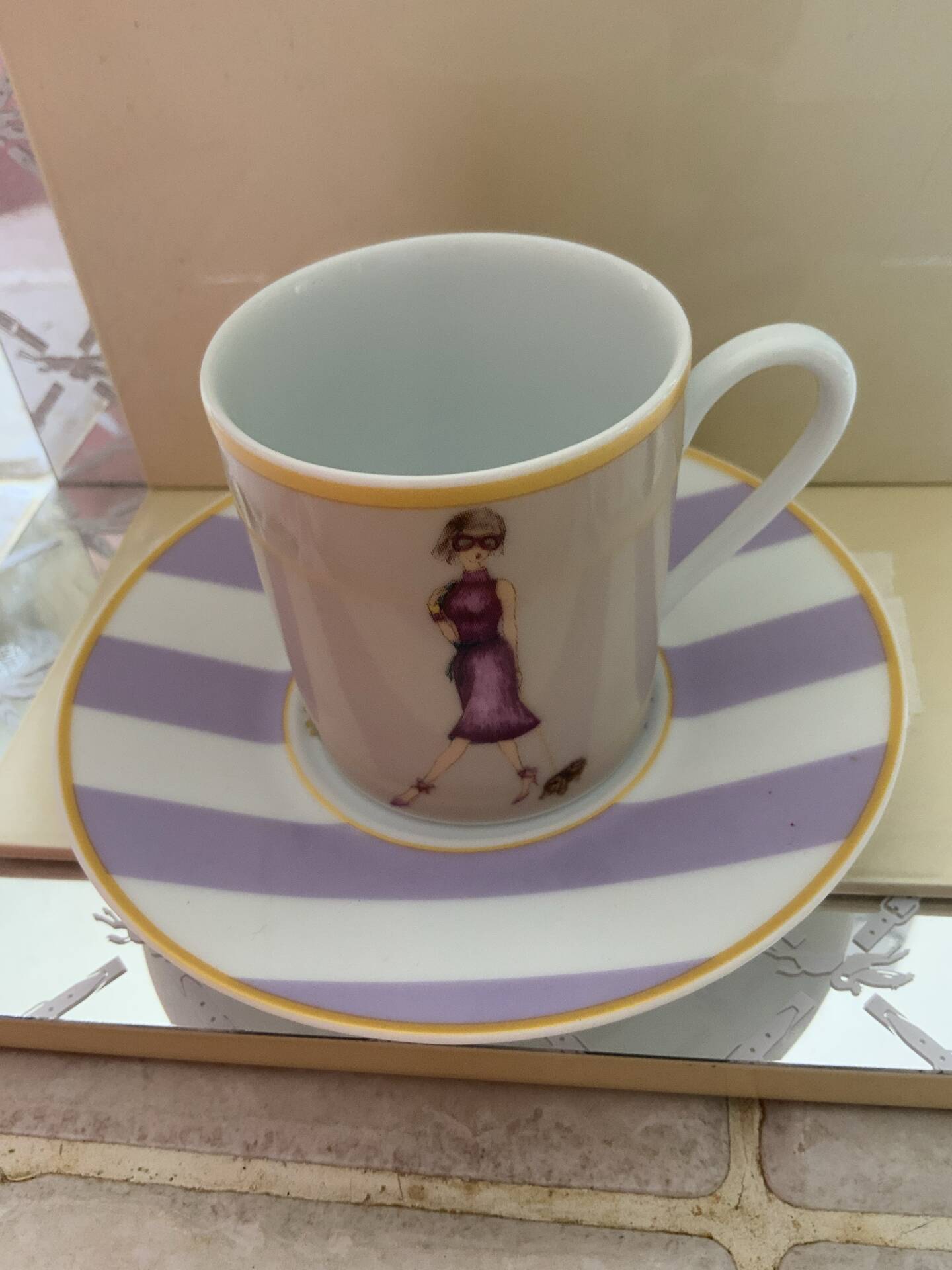 4 cups and saucers porcelain Menard de Noblat - shopping series