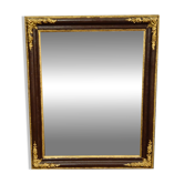 Miroir ancien en bois sculpté et doré – style classique