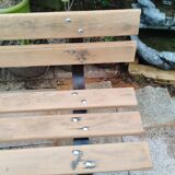 Garden bench with old cast iron legs