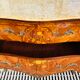 Commode de style Louis XV en marqueterie