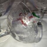 Beautiful set of seven crystal champagne glasses engraved with vine branches