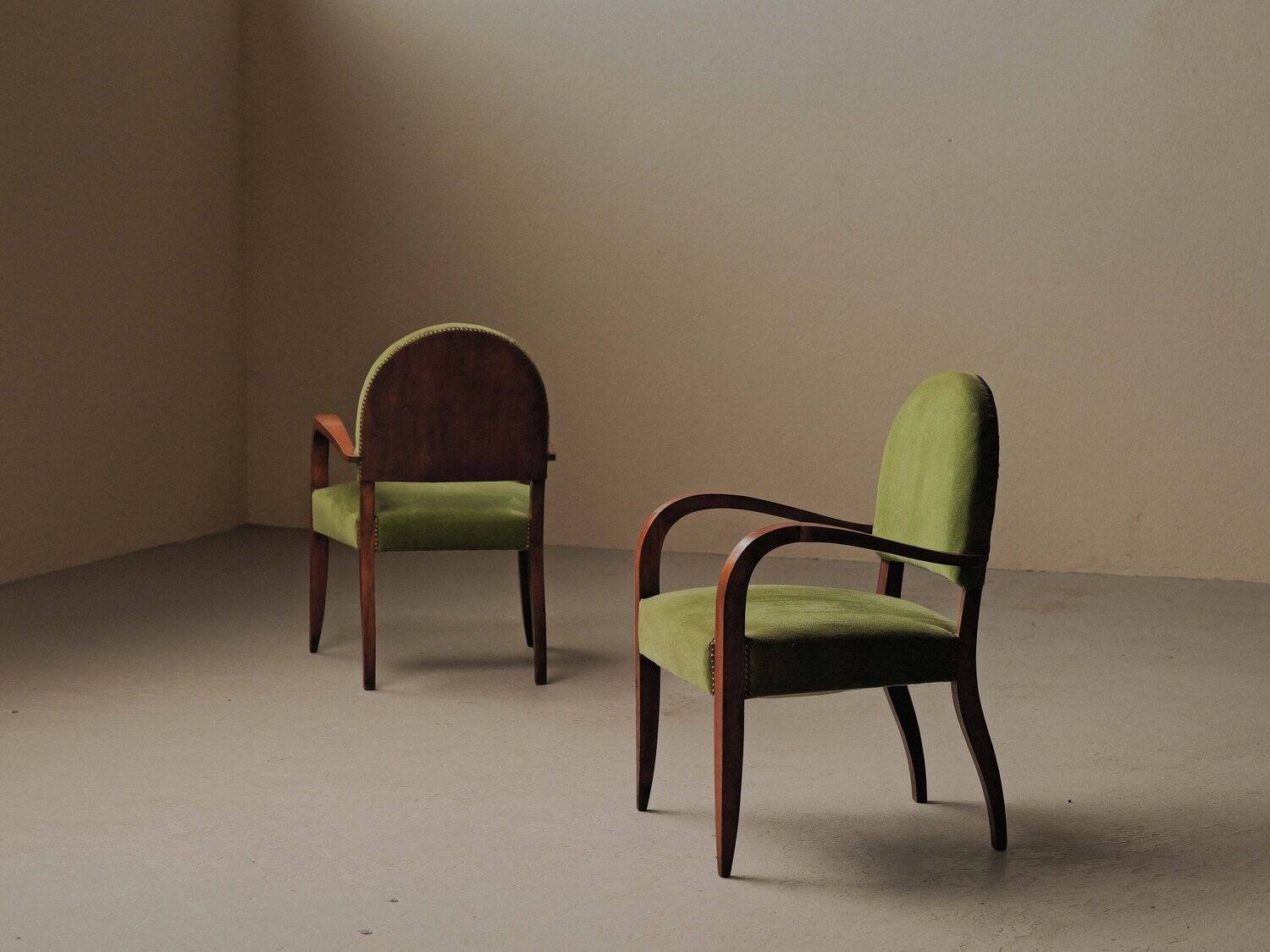Pair of Art Deco armchairs in mahogany, circa 1930.
