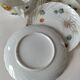 coffee pot, cup and saucers