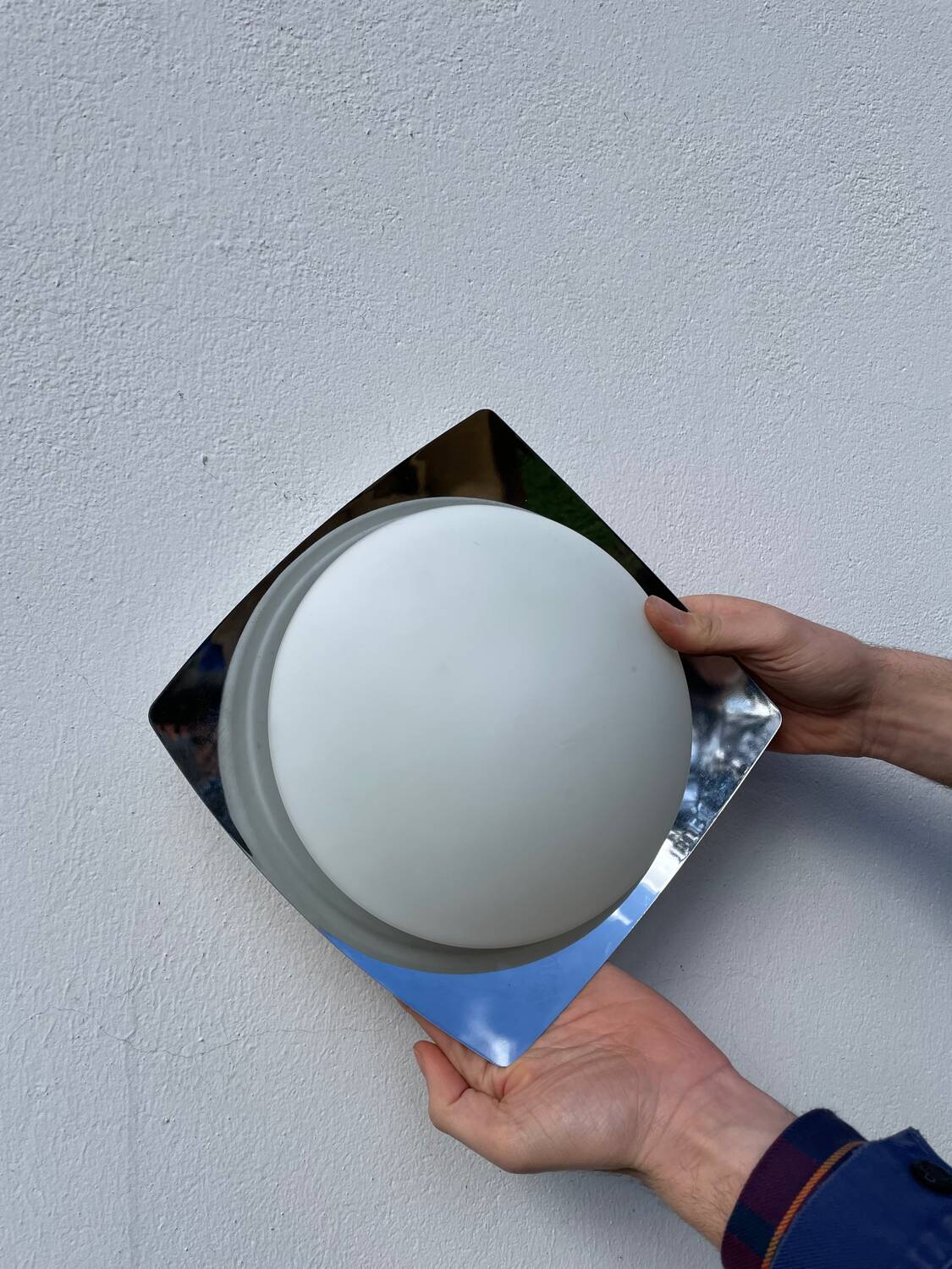 White glass and stainless steel ceiling light