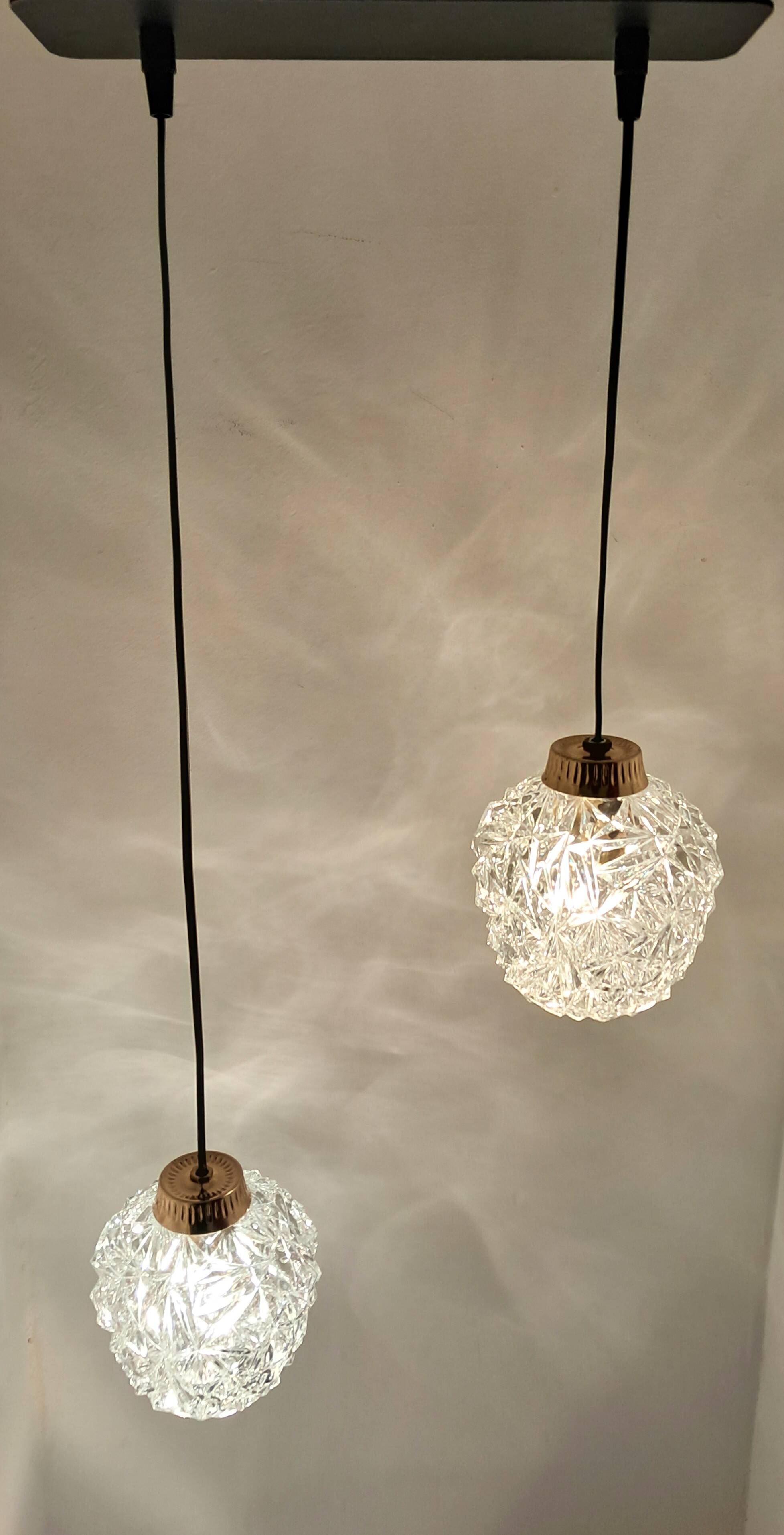 Two-light cascade pendant in gold-plated brass and molded glass