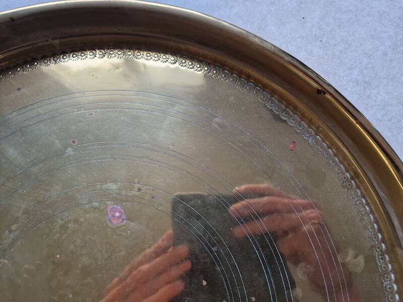 Antique copper or brass tray, Middle Eastern craftsmanship.