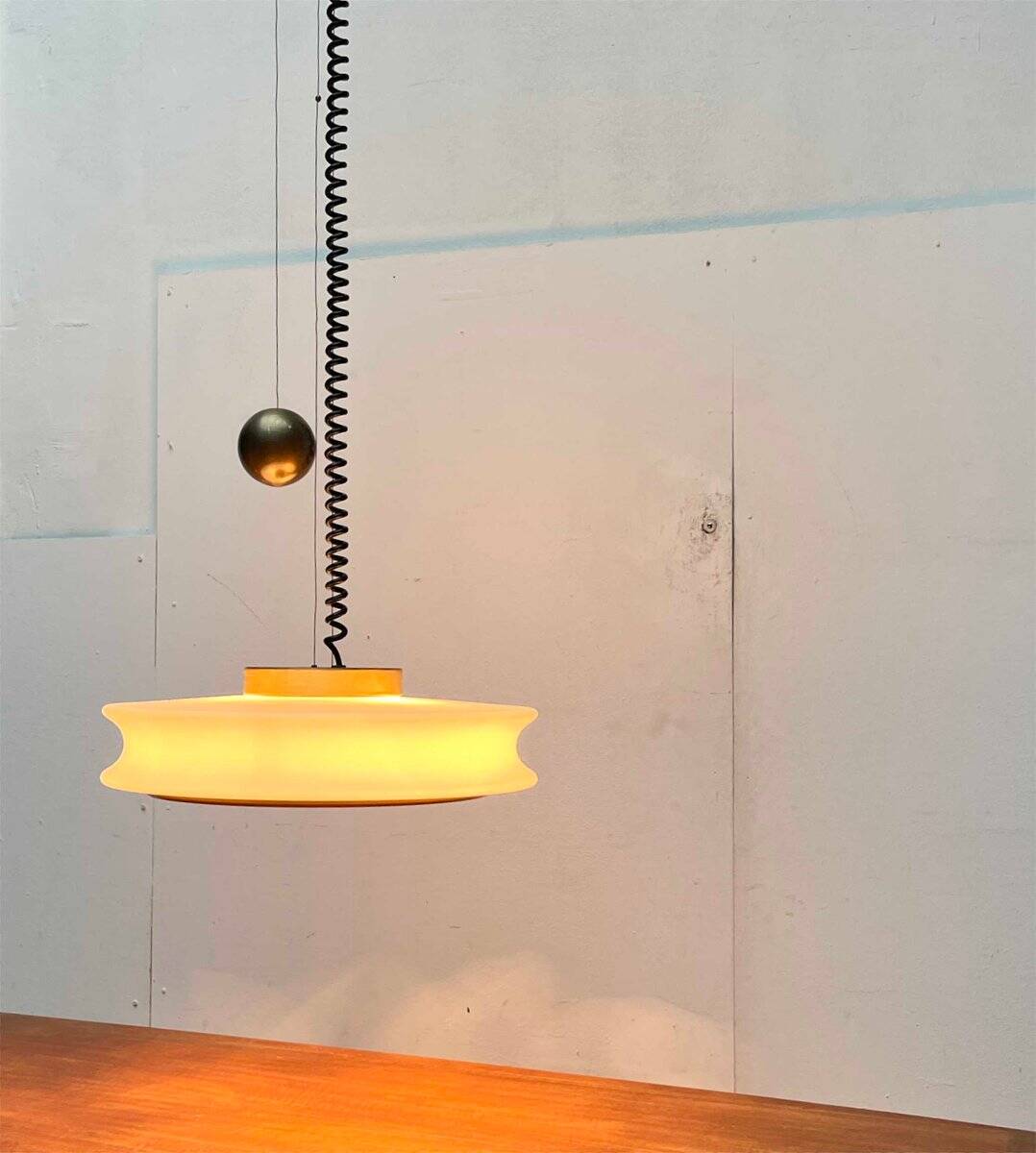 Orion counterweight pendant lamp in mid-century modern German space style, made of Staff Leuchten glass, 1960s.