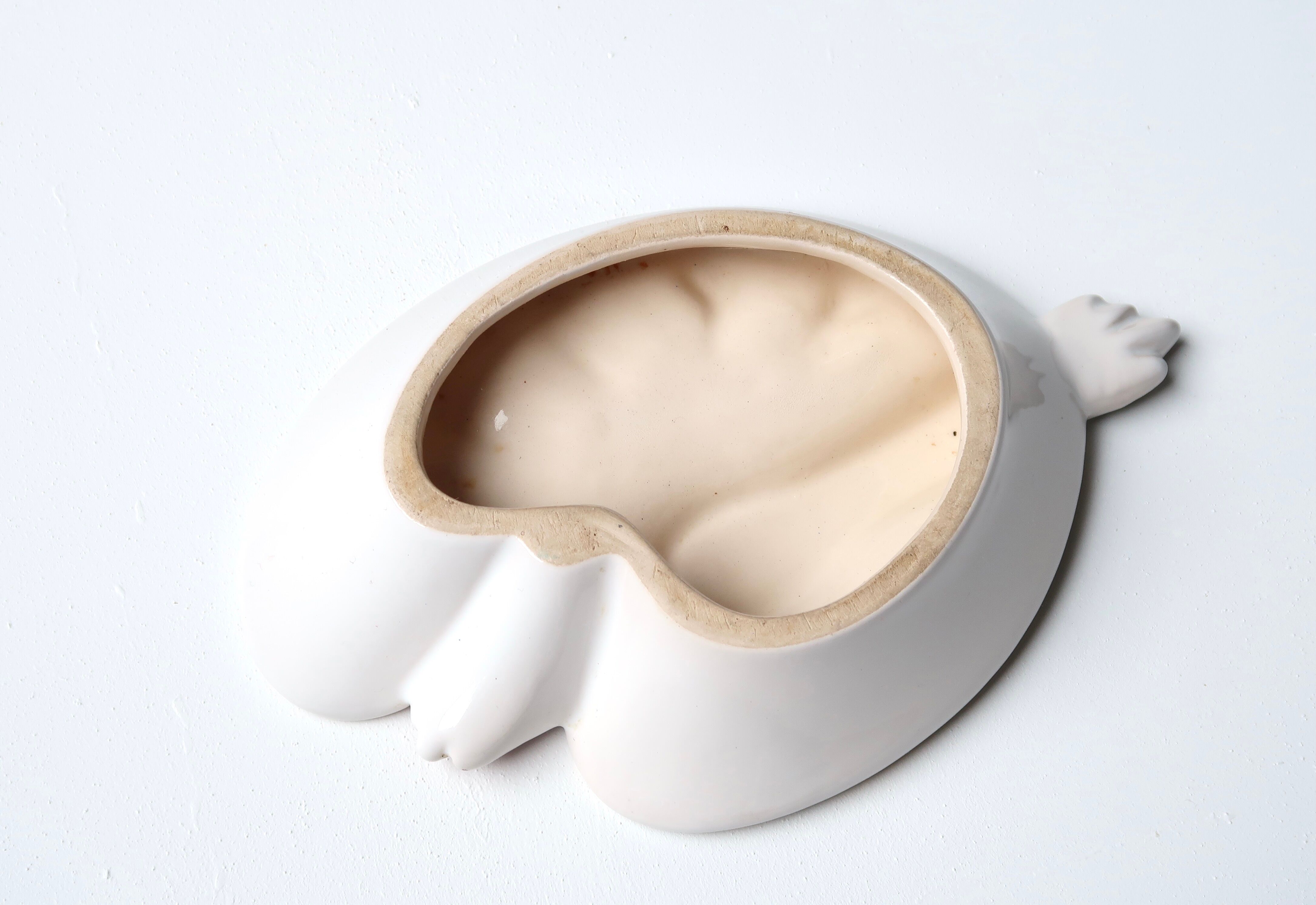Empty pocket ceramic paint palette, 50s