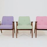 Pastel pistachio wool fabric Scandinavian armchair, oak wood.