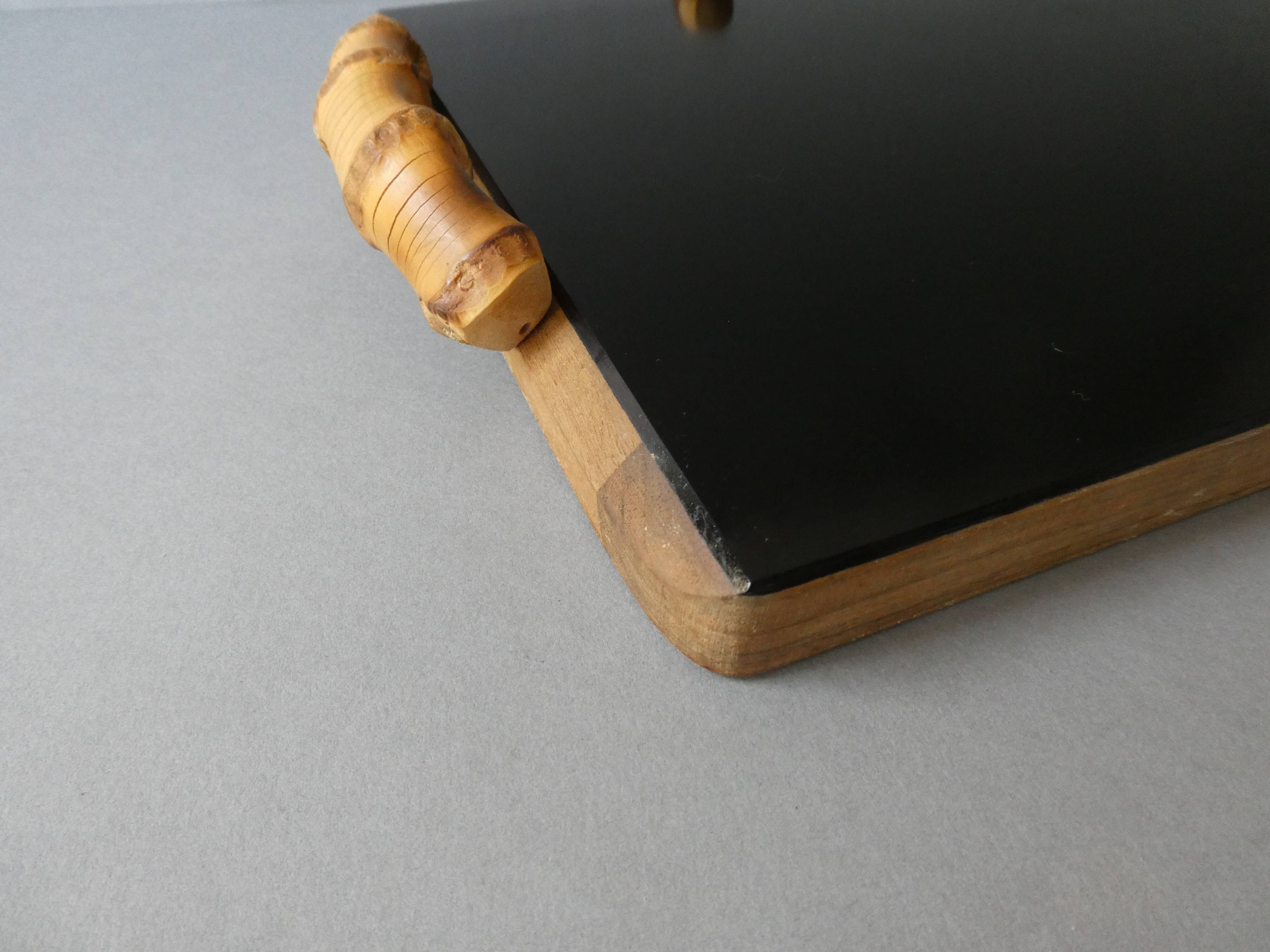 Wooden cheese board, bamboo handles, signed