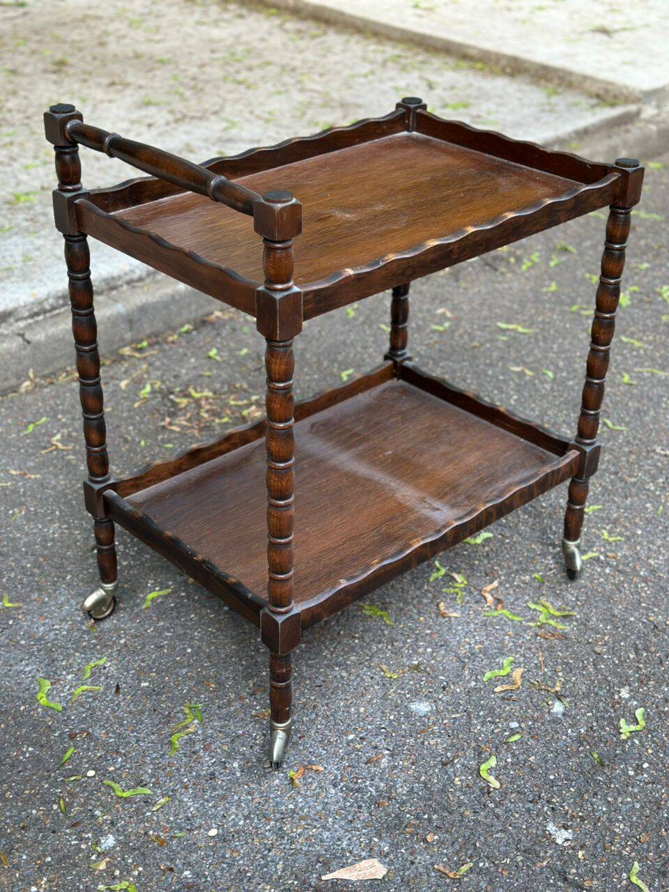 Vintage rolling bar side table in chic rustic style from the 1950s.