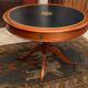 Circular table in solid mahogany and black leather claw base Restoration