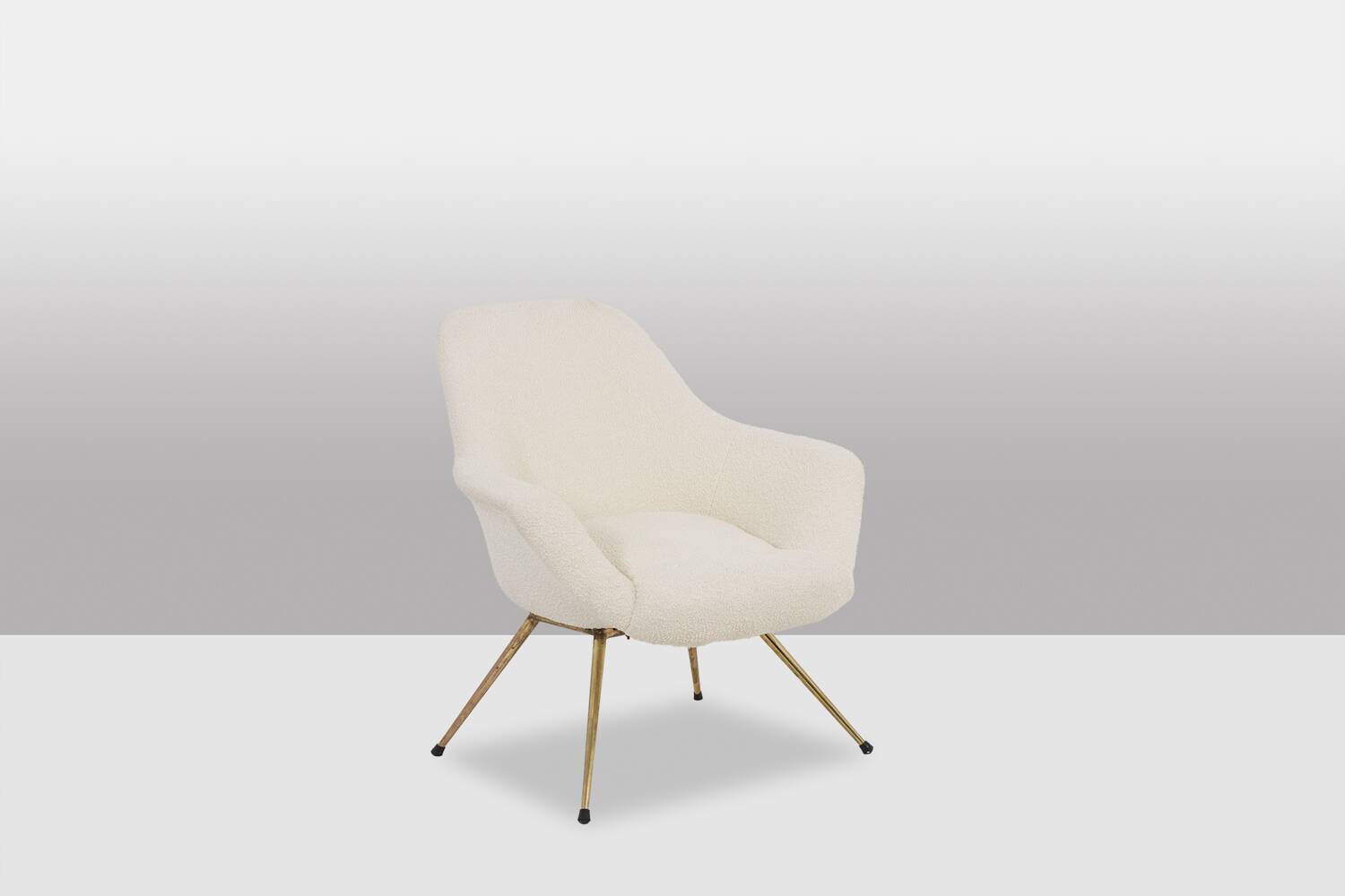 Pair of cocktail armchairs in gilded brass. 1960s.